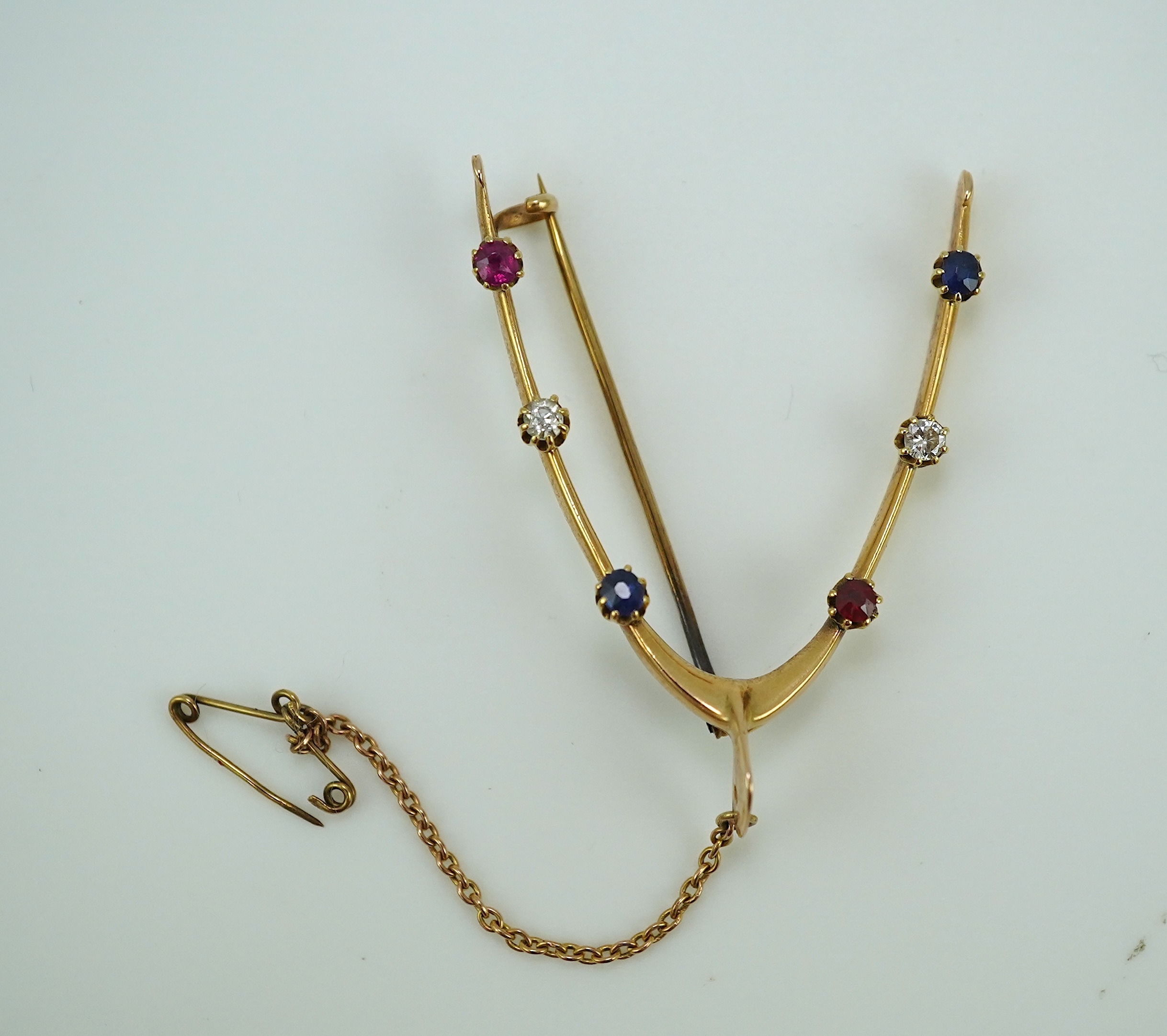 An Edwardian ruby, sapphire and diamond brooch, early 20th century